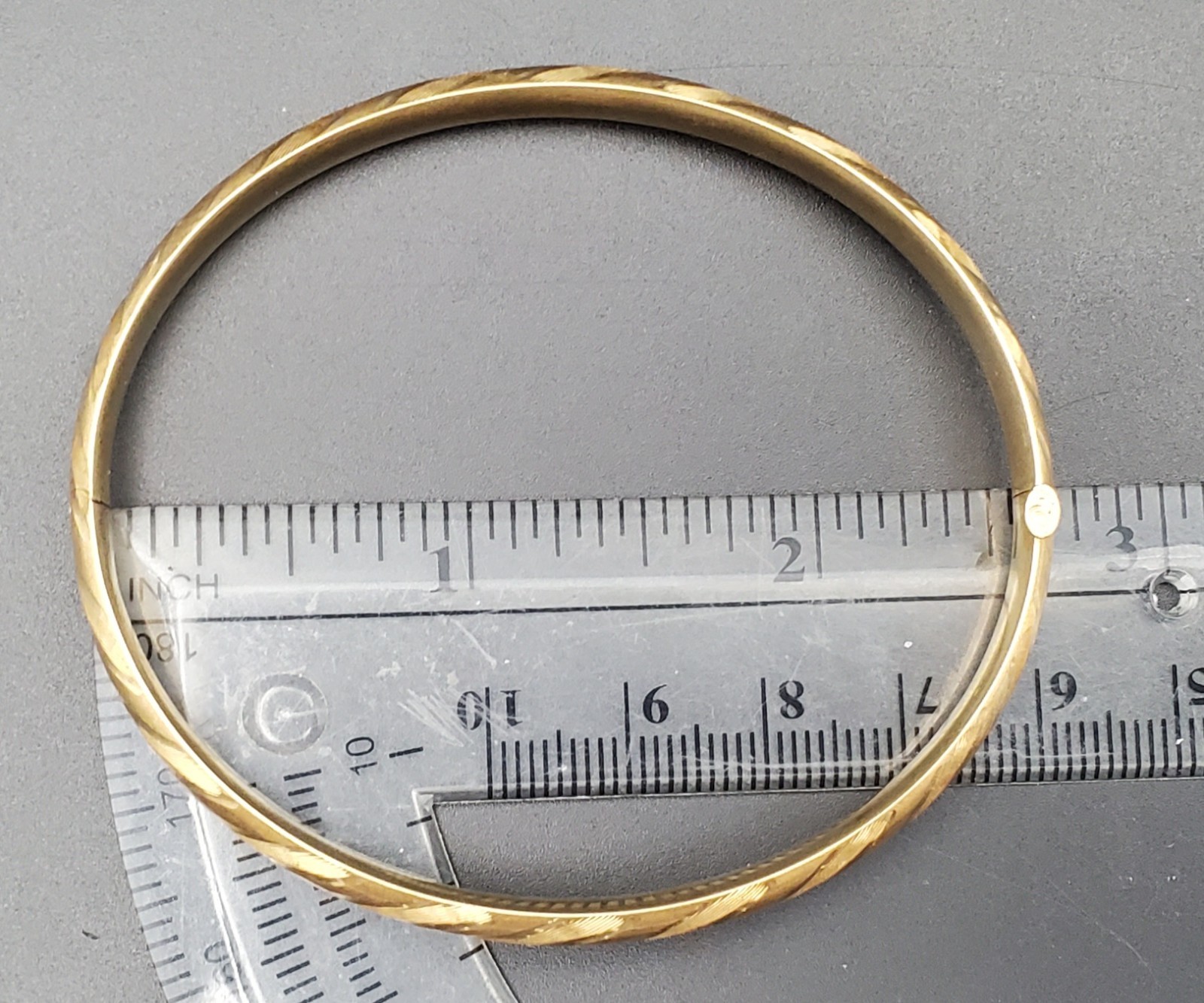 14K Bangle Bracelet, Open Hinge Design, Diamond Cut Finish 1/4 inch wide.