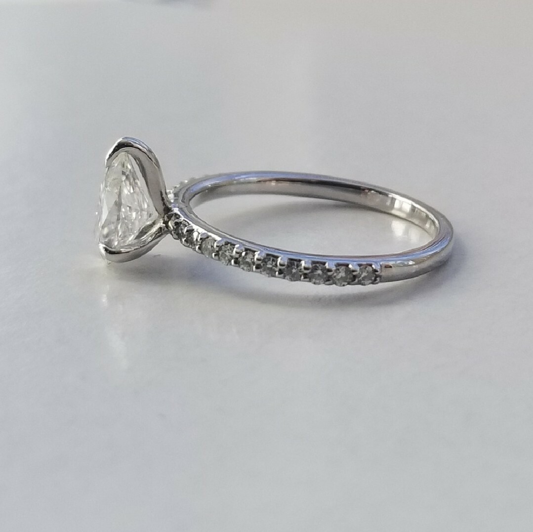 1.50 CARAT FOREVER ONE MOISSANITE PEAR SHAPE CHARLES & COLVARD RING