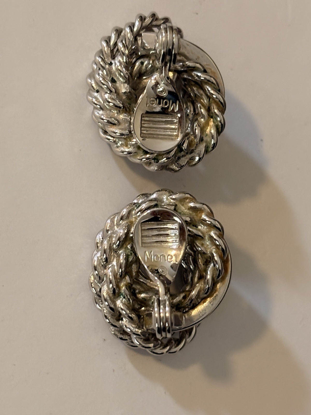 Monet Silver Tone Love Knot Textured Clip On Earrings-Vintage