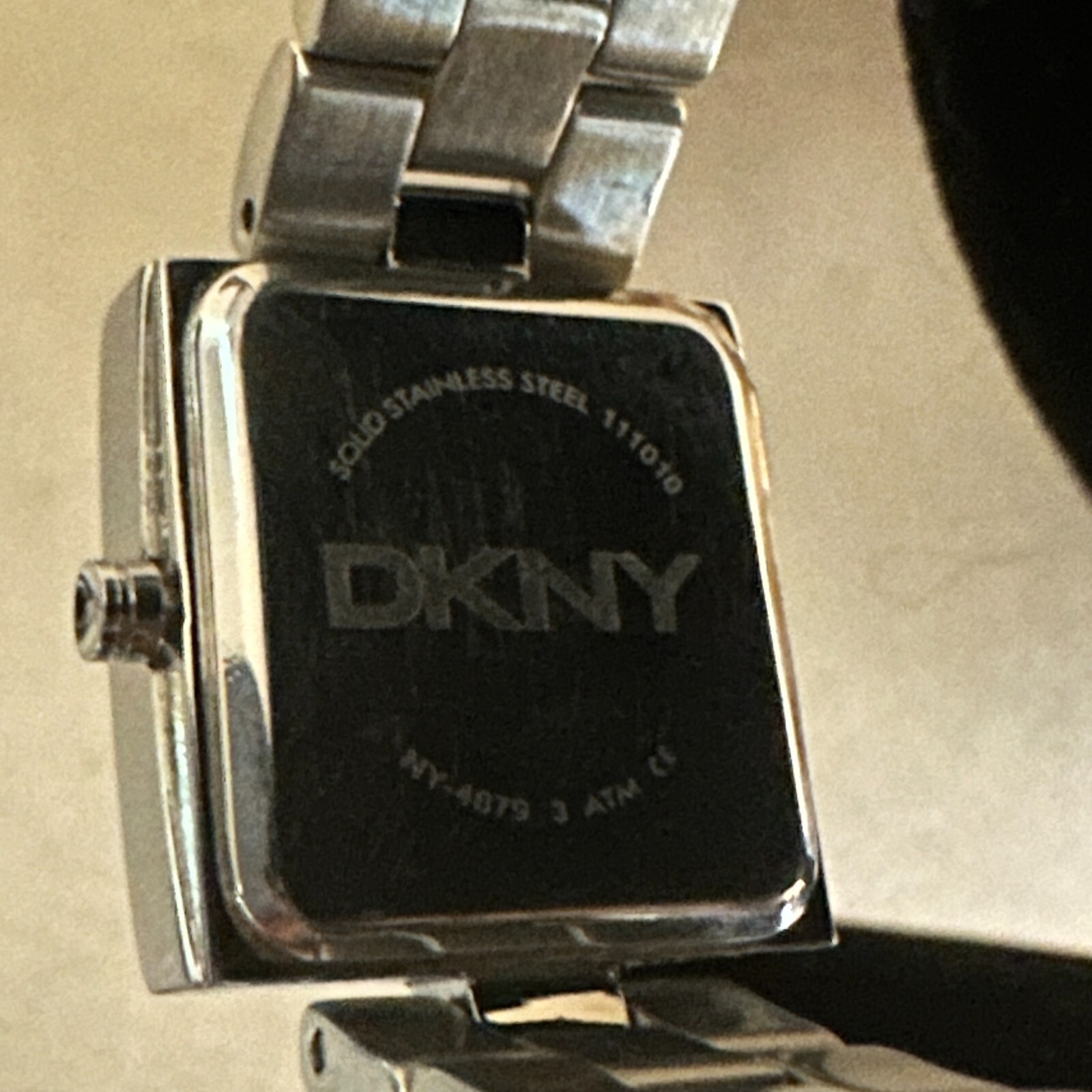DKNY Watch Women’s Analog Square Silver Tone Quartz Water Resistant 7 inch 22 mm