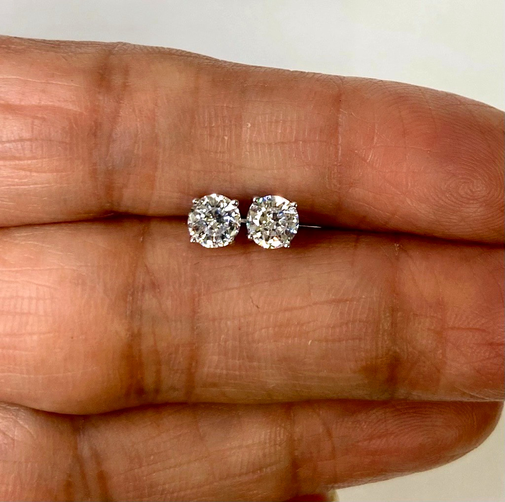 Diamonique Platinum Clad 100-Facet 1.00 cttw Ladies Stud Earrings QVC
