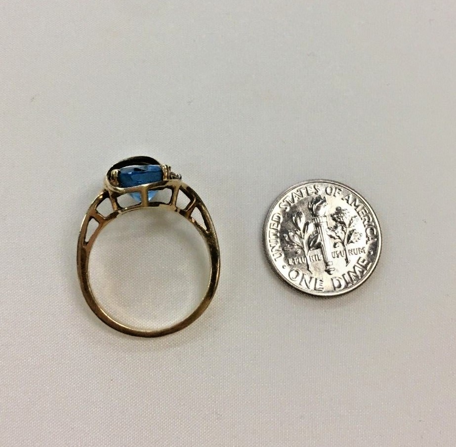 10k Ring with Blue Topaz and Diamonds Size: 6.25
