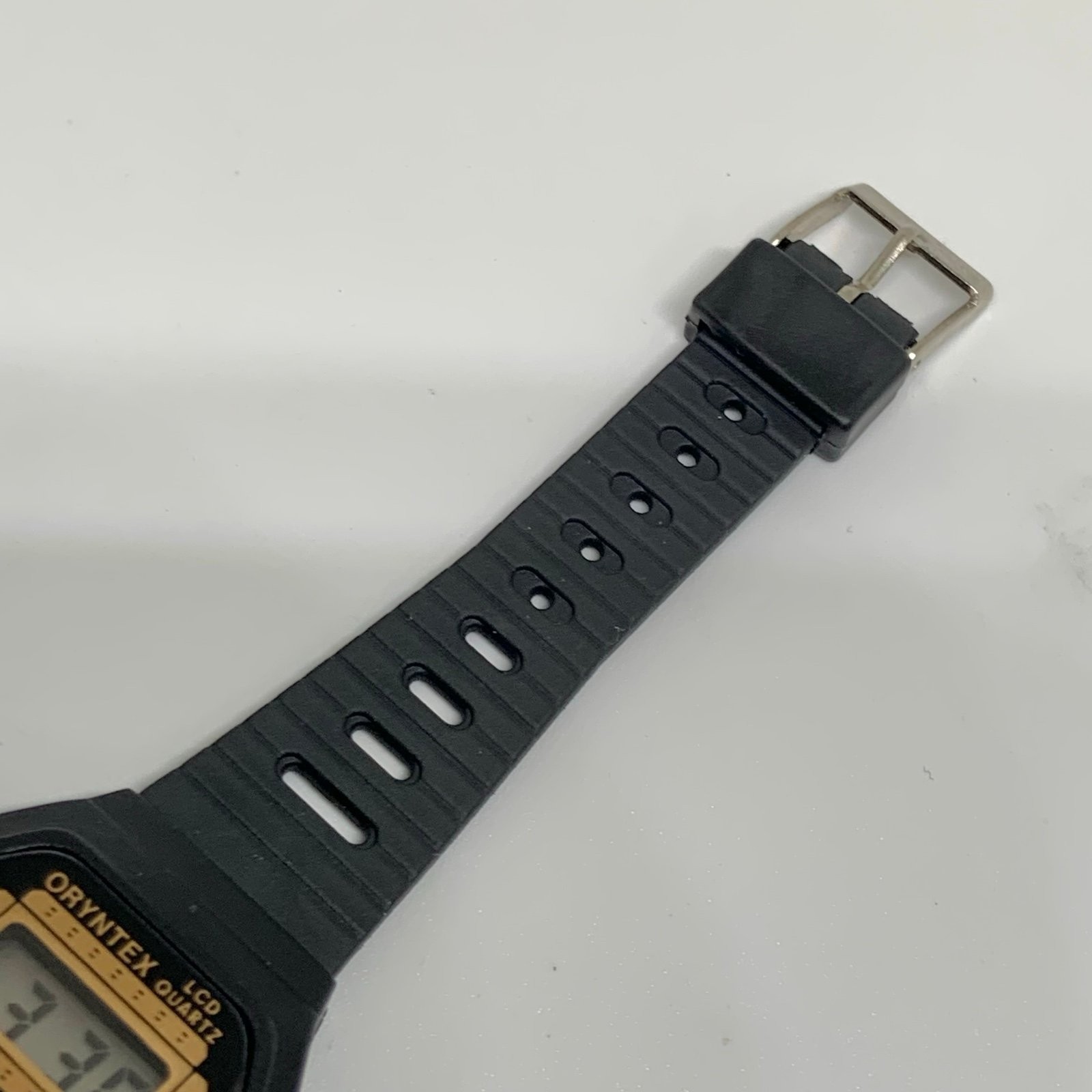 Vintage Oryntex Lcd quartz digital kids/women watch 26mm black tone running