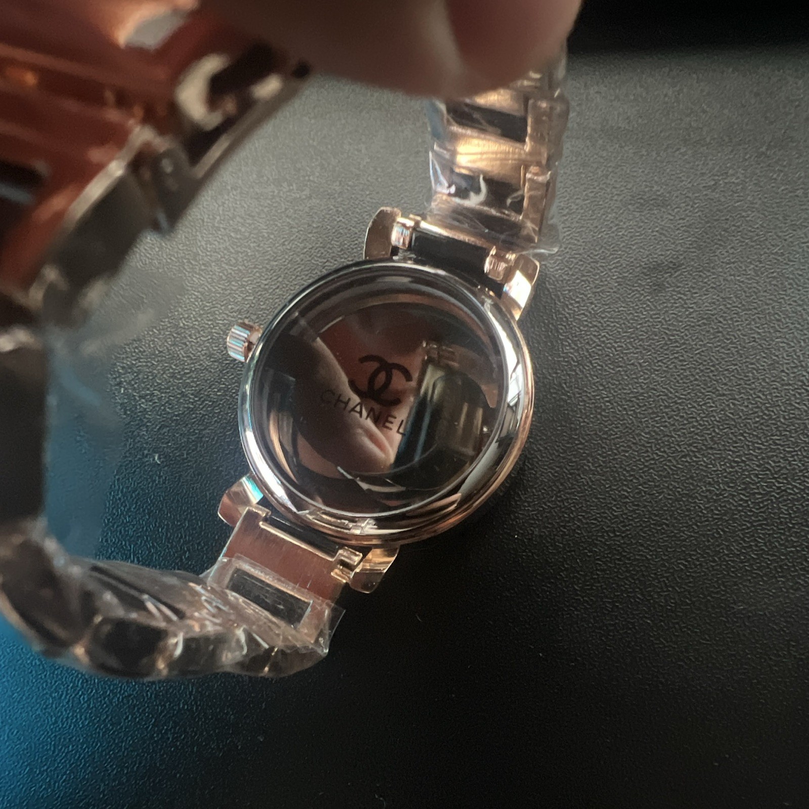 CHANEL Women’s Quartz Analog Watch Black Logo Dial Rose Gold Bracelet
