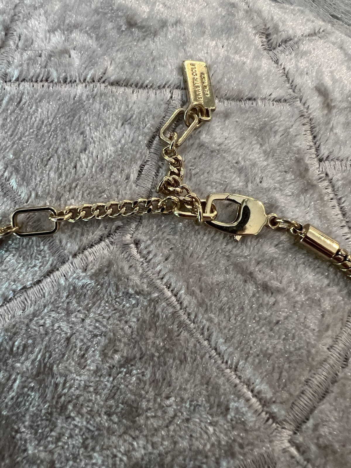Kenneth Cole Necklace Double Serpent Chain Sporting A Large Gold Square Pendant