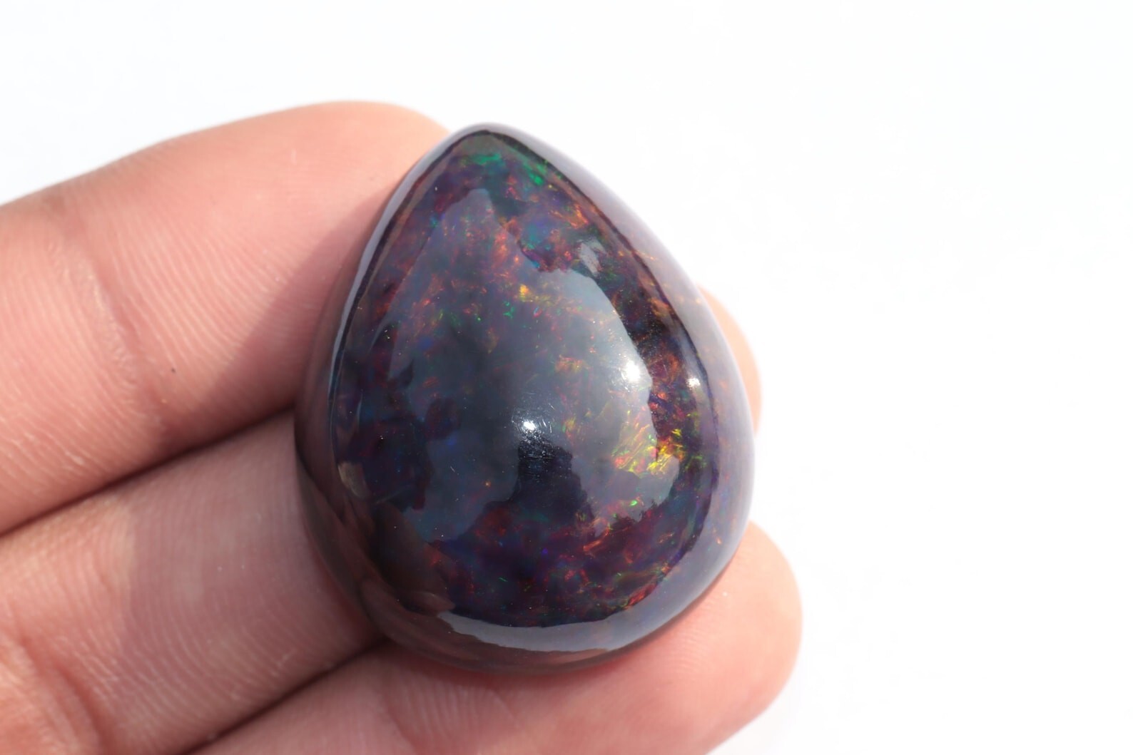 59.95 Carat Ethiopian Black Opal Cabochon 31x26x15 MM Pear Shape Welo Fire Opal
