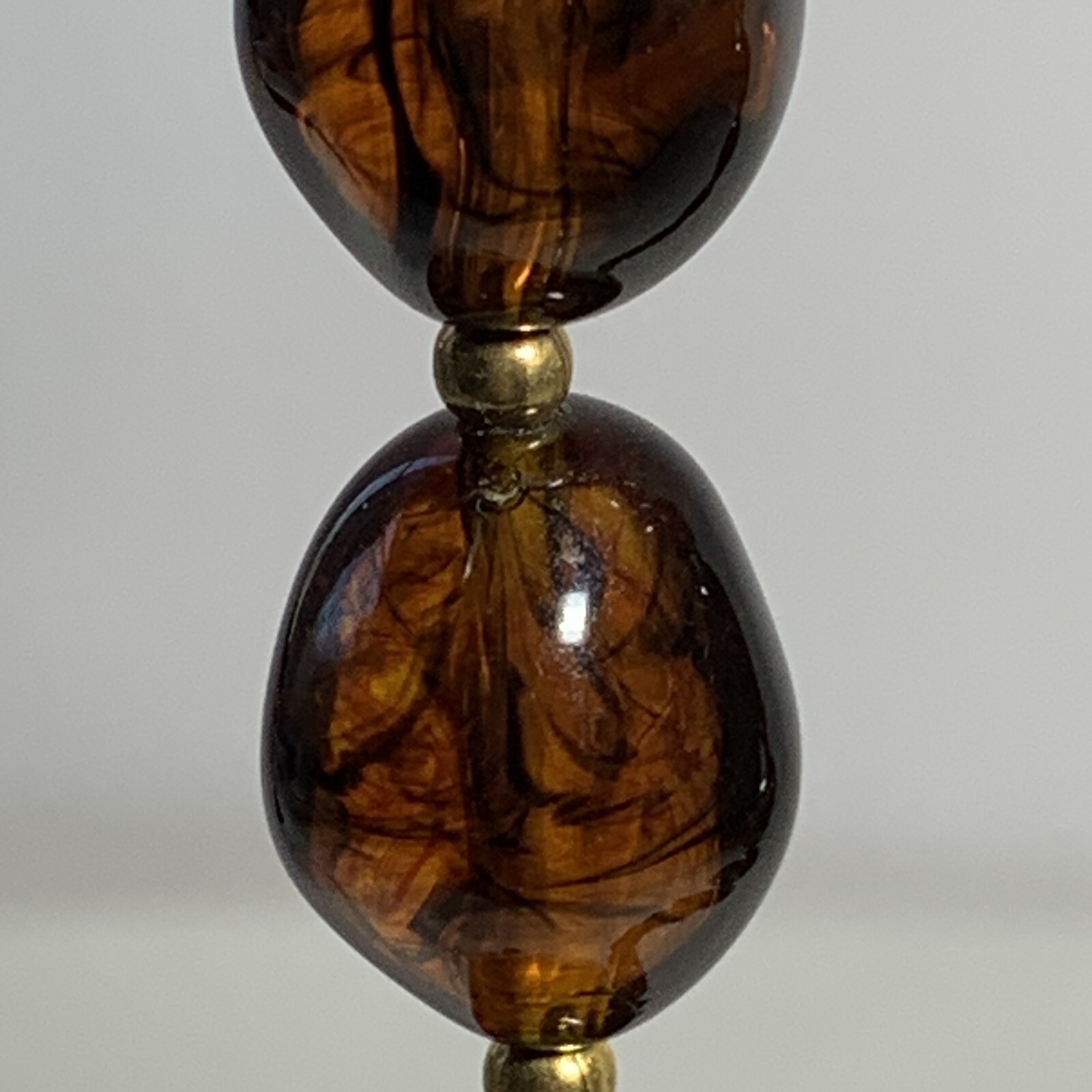 VTG Crown Trifari Lucite Amber Swirl Bead Necklace Oval Nuggets Gold Tone 36″
