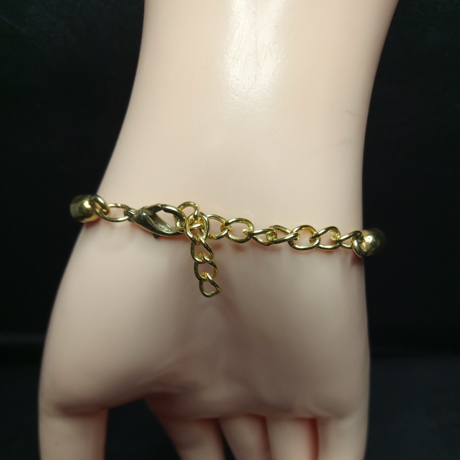 MURANO GLASS Gold/Green Rubber Cord Bracelet. 6312