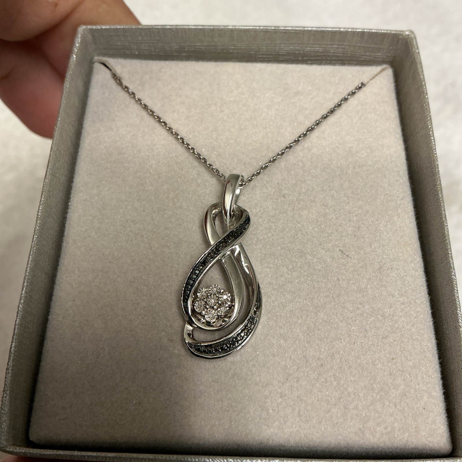 Zales Sterling Silver Diamond Accent 7 Stone Infinity Pendant Necklace, 18″ 3601