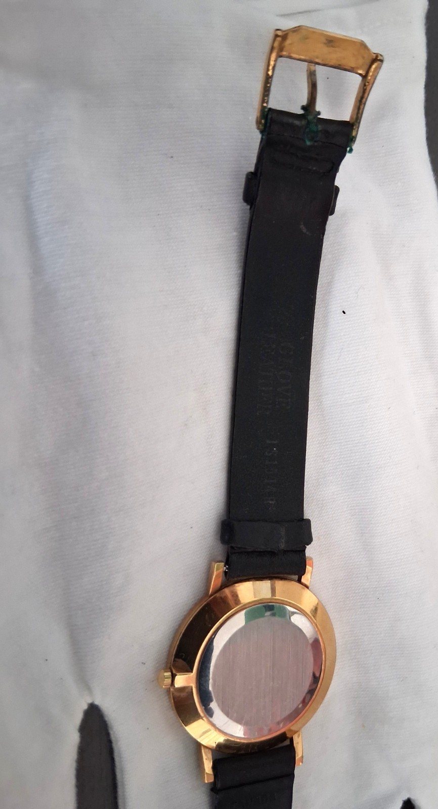 Movado Museum Wrist Watch for Men, gold face, black leather band, NEW Battery