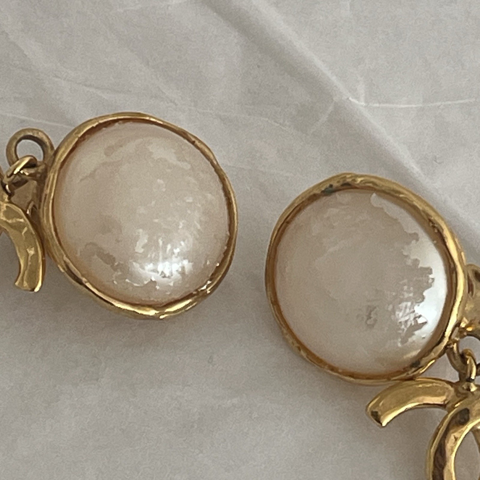 Auth. vtg CHANEL 1995 gold 3D CC logo dangle with round moonlight stone stamped