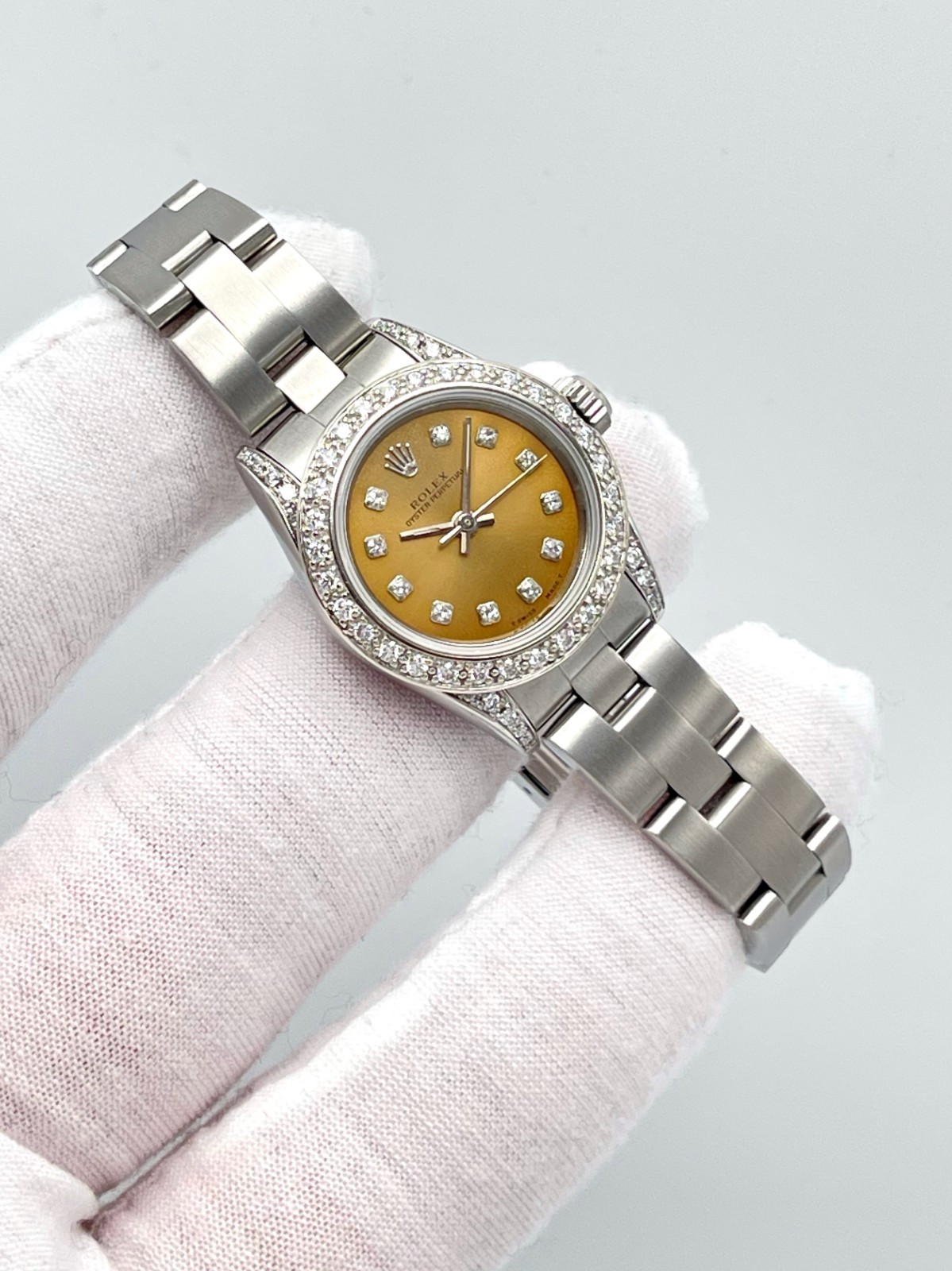 Rolex Oyster Perpetual 67180 24mm Salmon Dial Diamond Bezel Diamond Lugs Box
