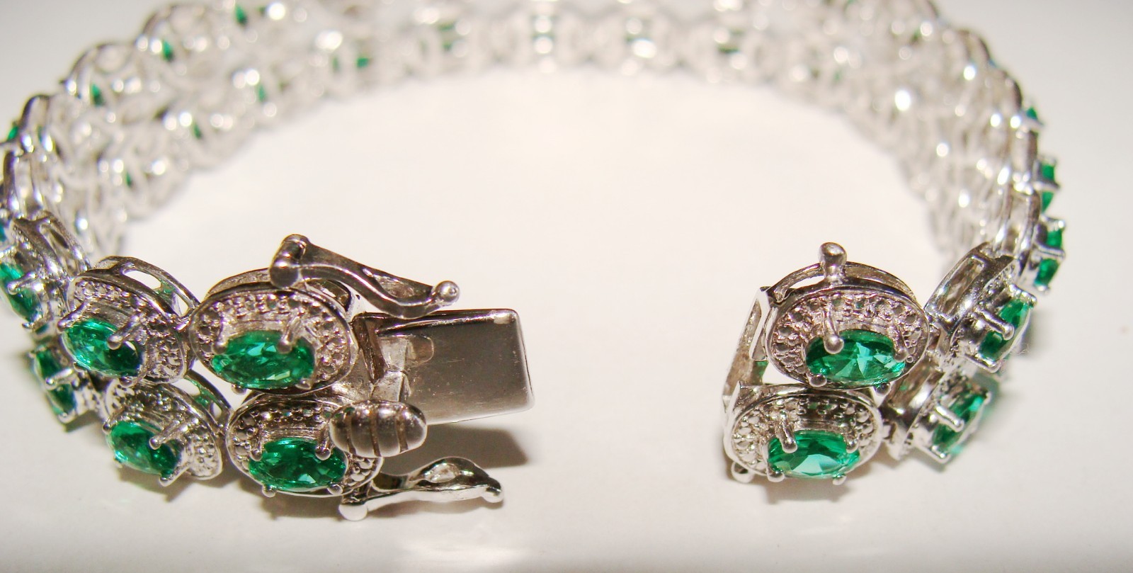 Designer 22.4g Sterling Silver Lab Created Emeralds & 4 Clear Stones Bracelet 7″