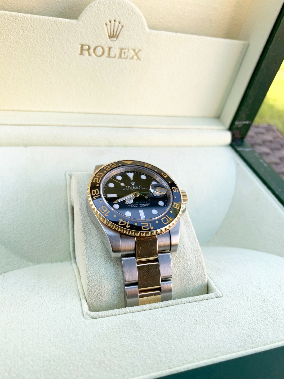 Rolex GMT-Master II Two Tone Gold Ceramic Bezel Black Dial Bidirectional Bezel