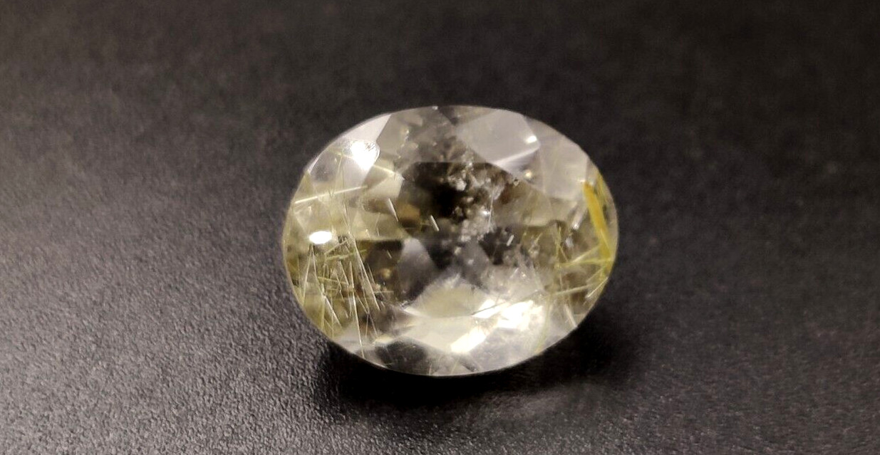 6.9 Ct Natural Rutilated Quartz Gemstone 13.4X10.8X8.2mm Oval Faceted Cut W204