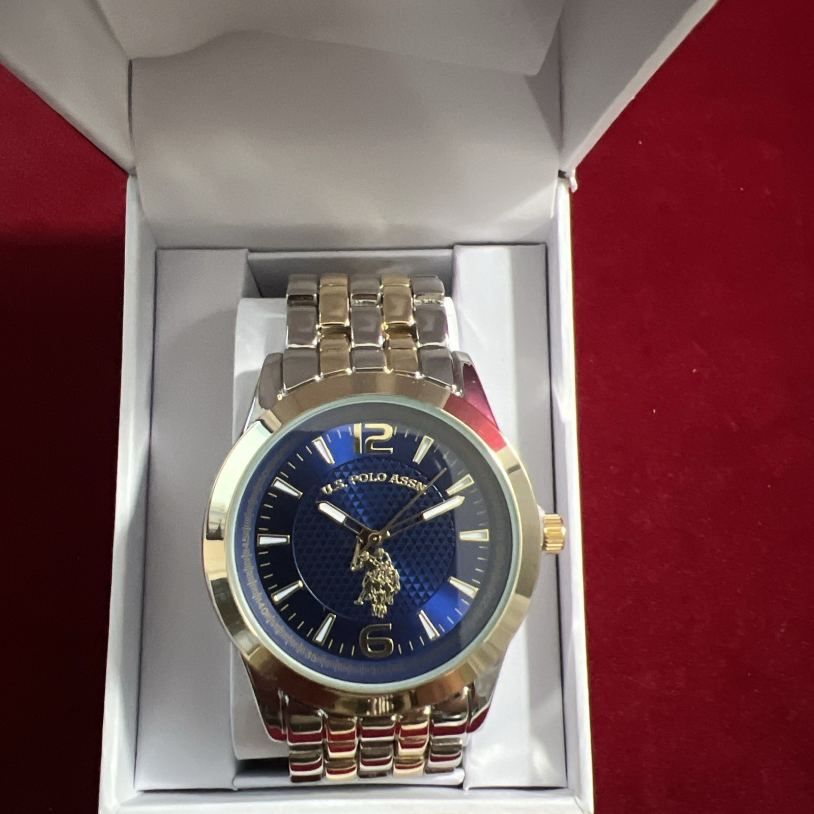 U.S. Polo Assn. Men’s Analog Bracelet Watch Blue Dial with Gold-Tone Bezel