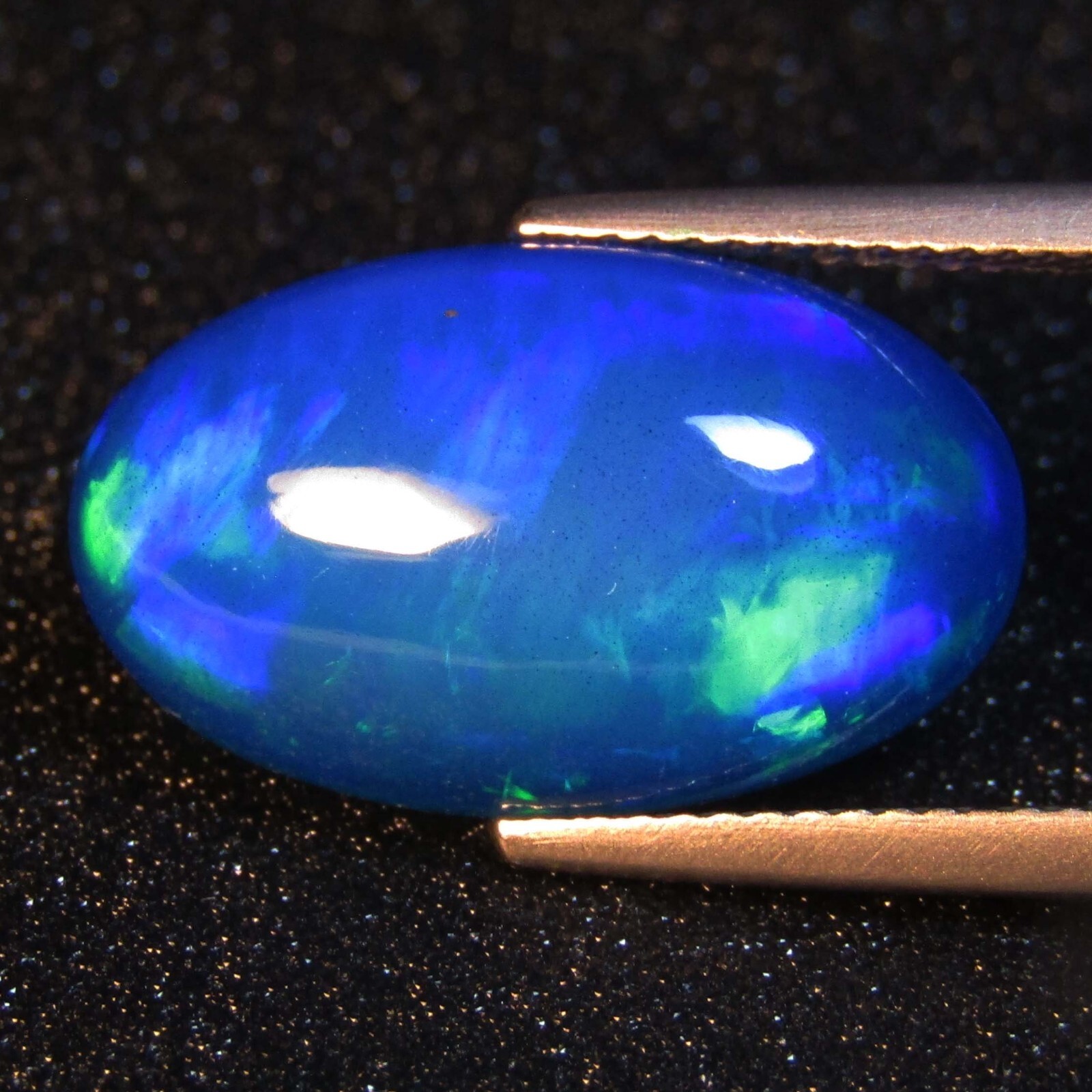 7.16Cts Natural Color Play Ethiopian Blue Opal Oval Cabochon Loose Gem