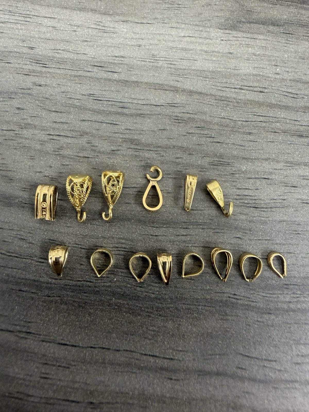 14 Miscellaneous Pre Owned 14k Yellow Gold Bails In Various Sizes