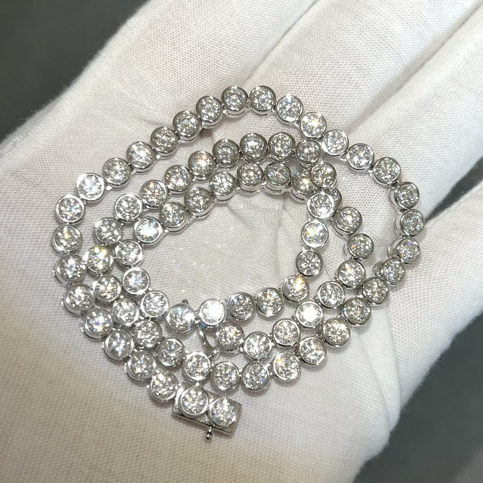 25 TCW Round Cut Moissanite Iced Bezel Tennis Necklace in 14K White Gold Plated