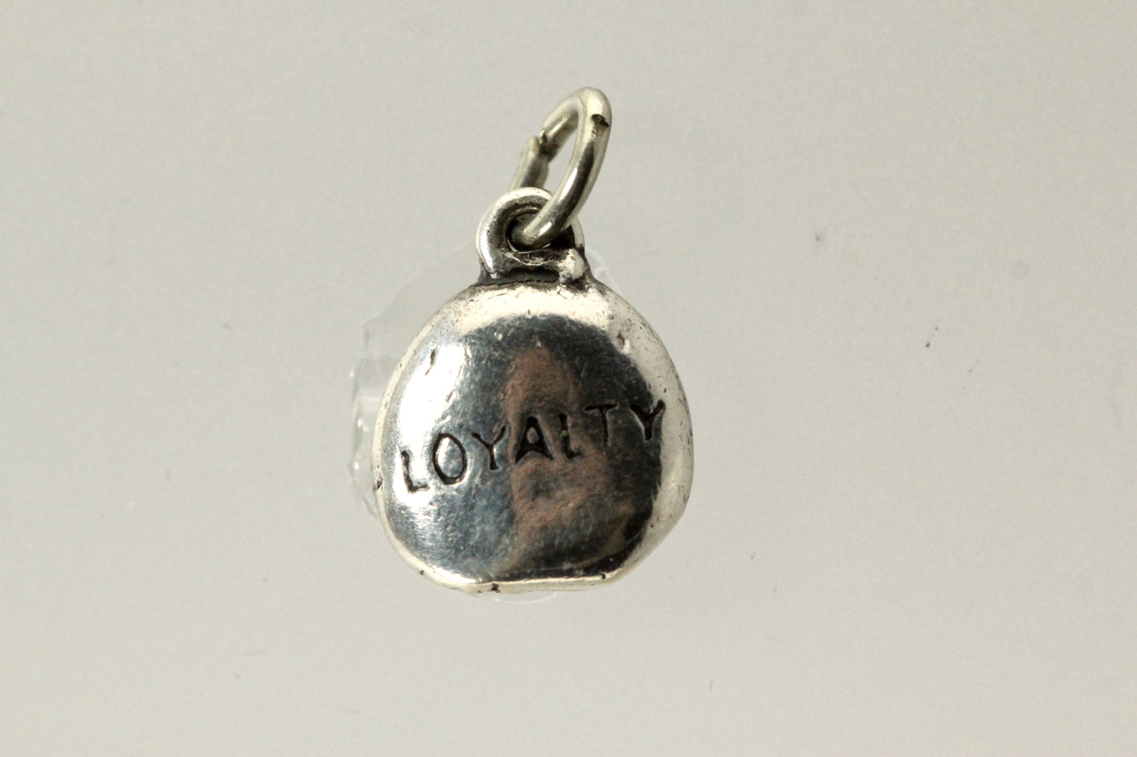 Unmarked 925 Sterling Silver “Loyalty” Pebble Charm 2.4 Grams (PEN4010)