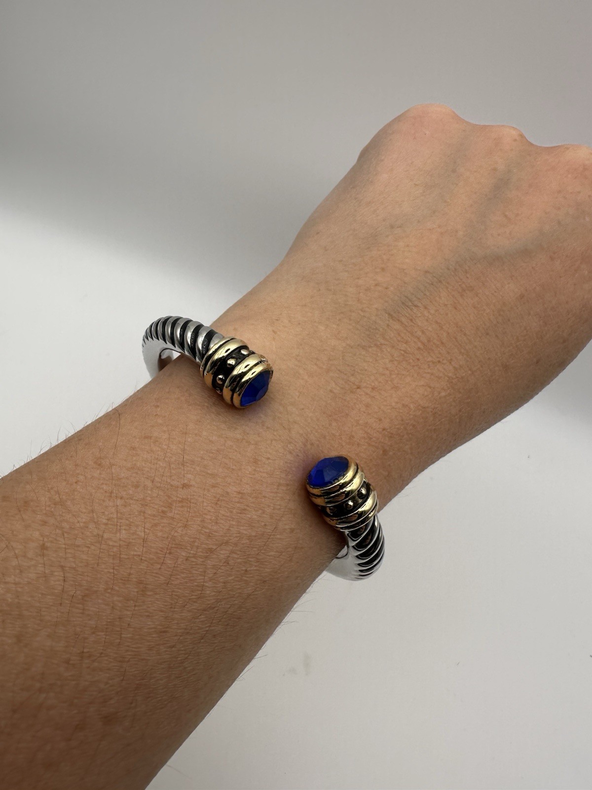 Two Tone Twisted Cable Cuff Bracelet Blue Round Bezel
