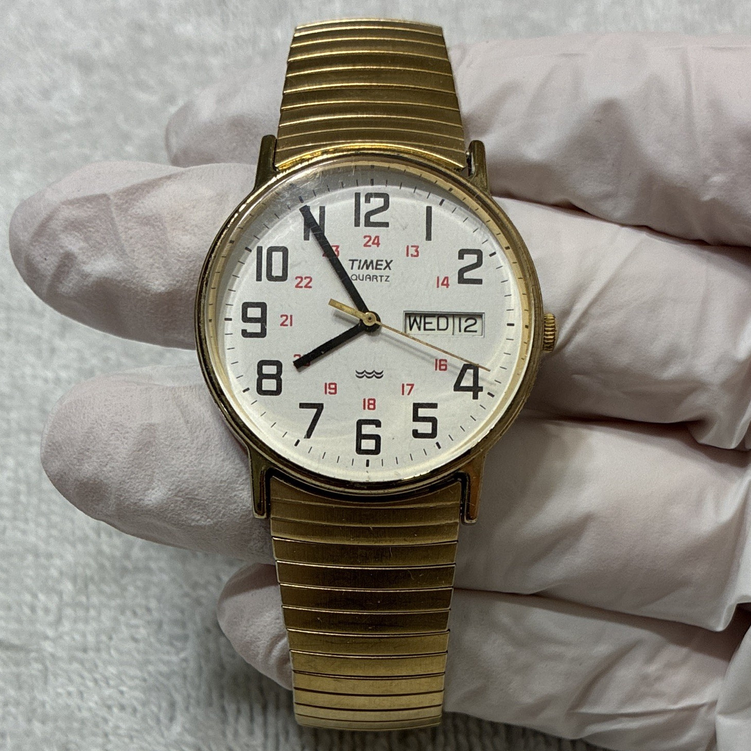 Timex Quartz Men’s Day/Date 34mm White Dial Gold-Tone Metal Bracelet Watch