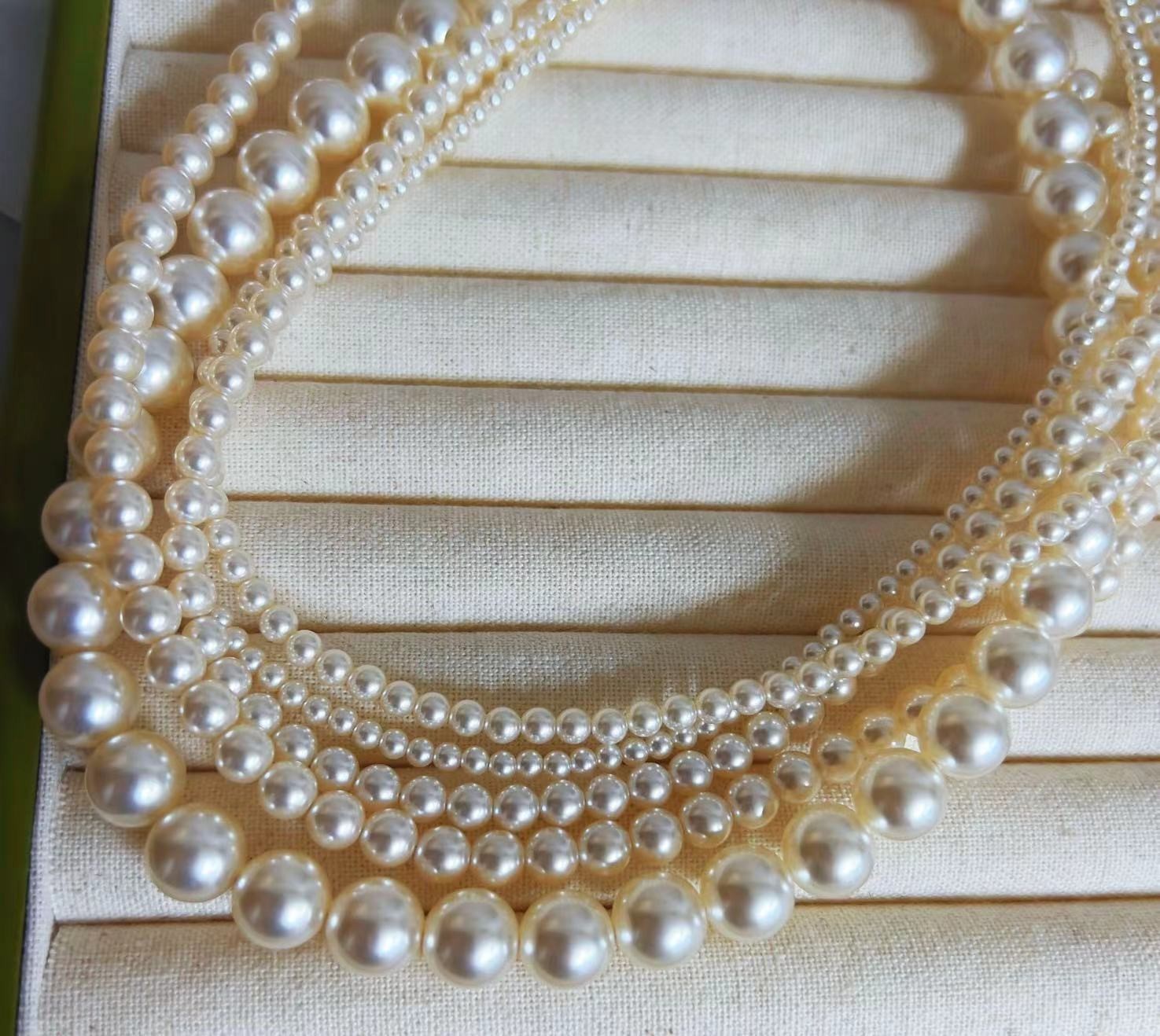 650 Warm White Perfectly Round High-Intensity Pearl Necklace