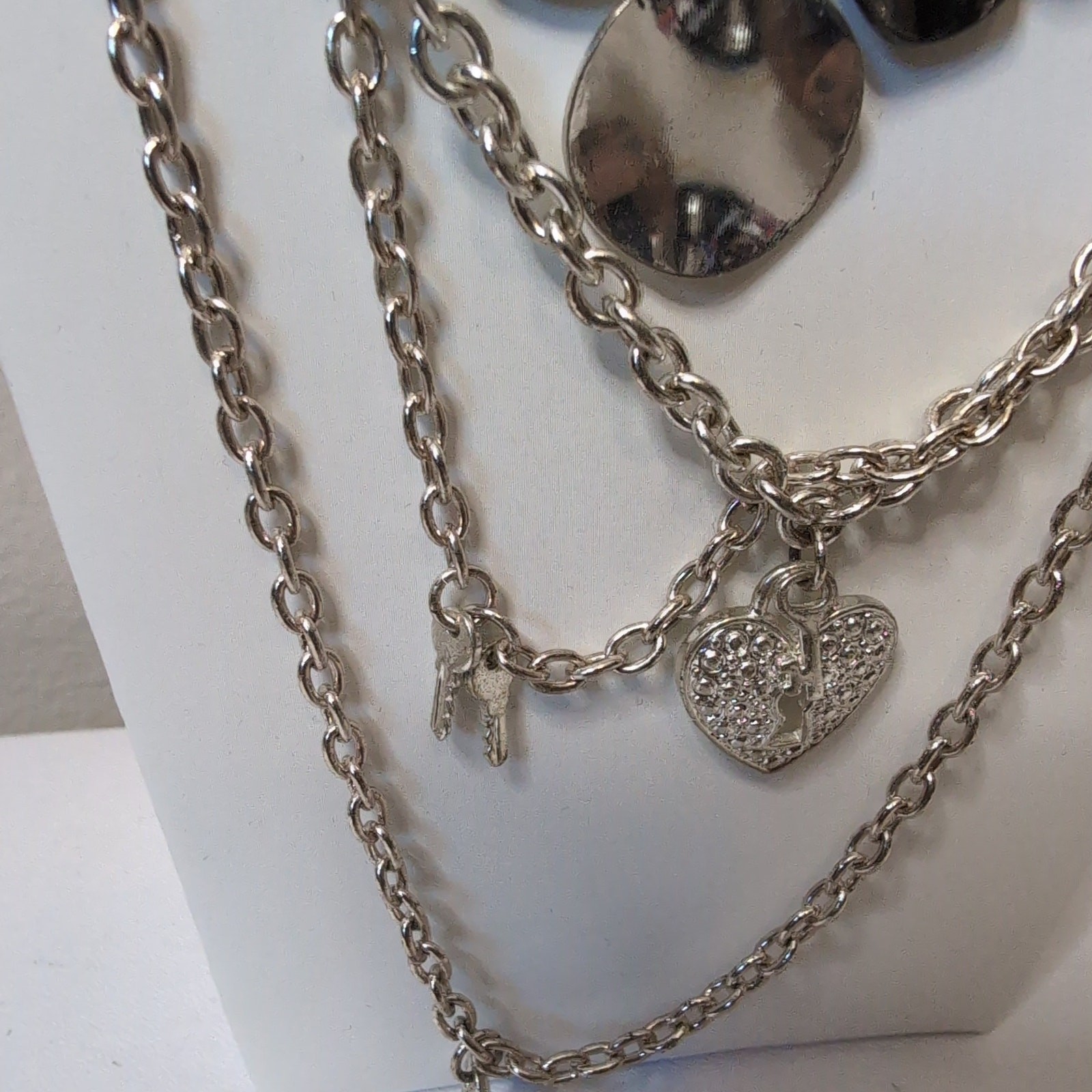 Layered Silver Tone Disc And Heart Charm Necklace Set