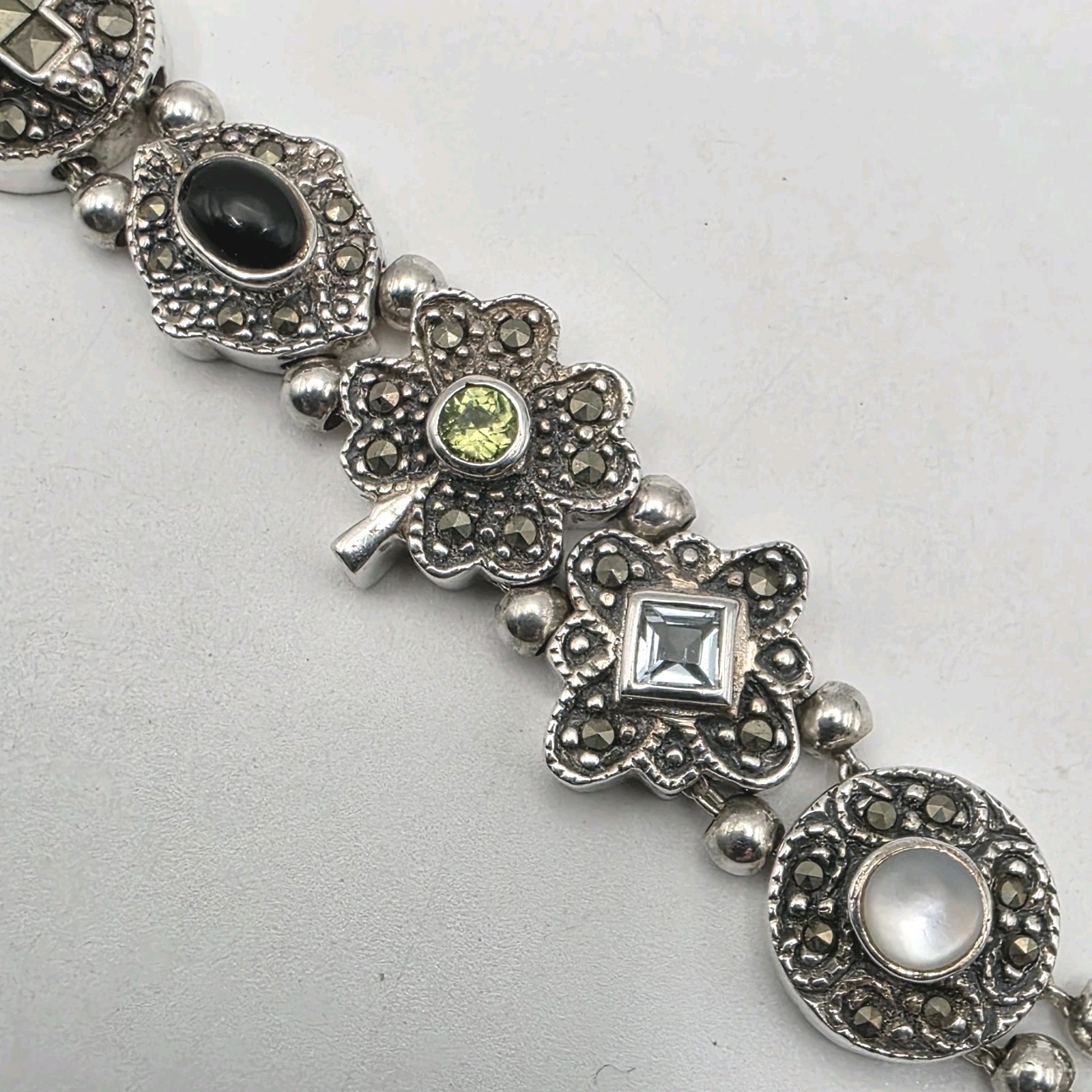 Sterling Silver Blue Topaz Amethyst Peridot Marcasite 6.5 Inch Bracelet 24.78g