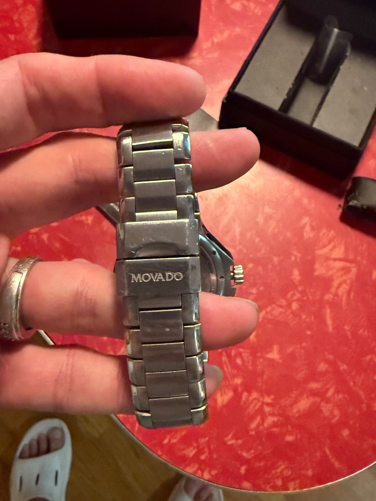 MOVADO 800 SERIES WATCH WITH BLCK BEZEL AND DIAMOND MAKERS – MENS WATCH