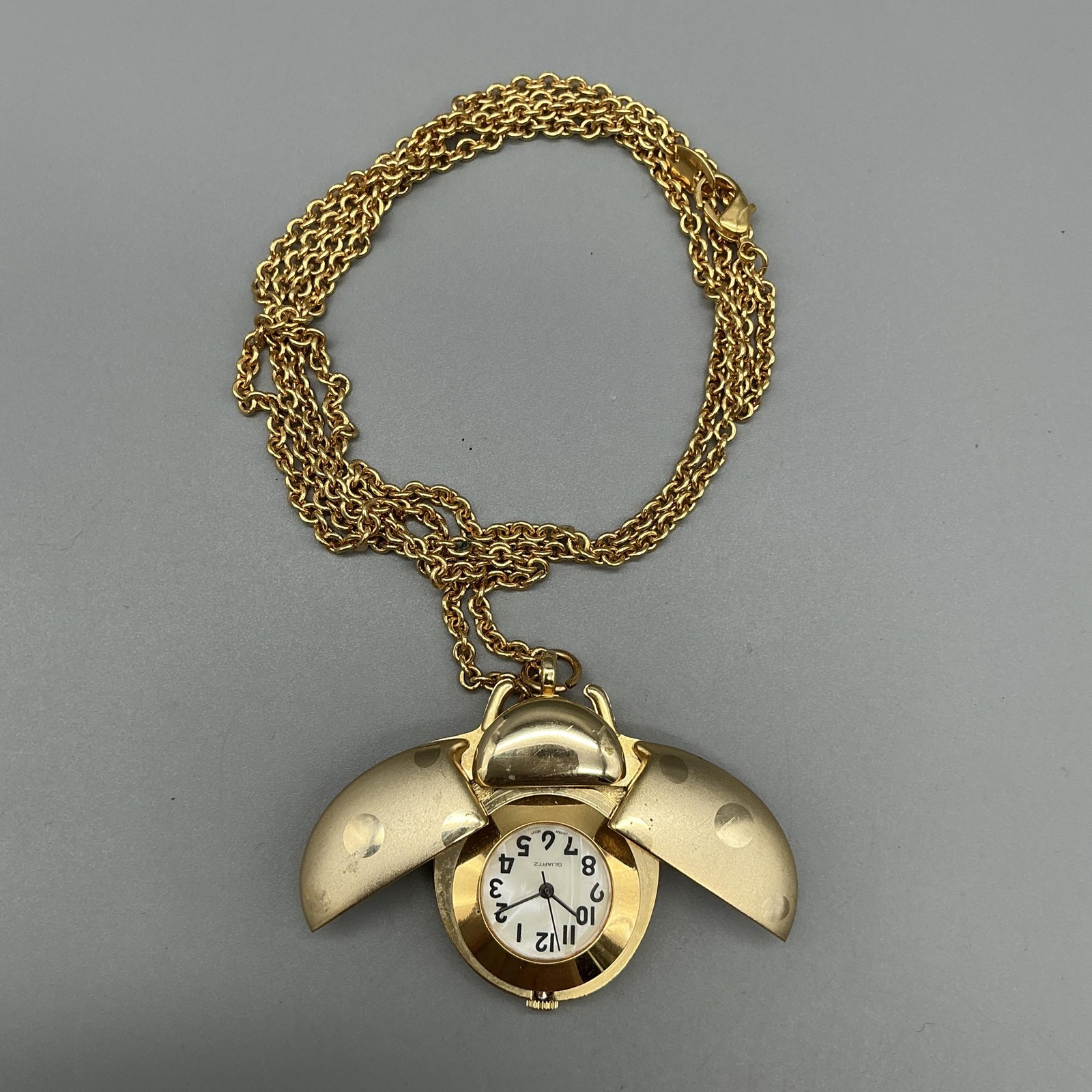 Ladybug Hidden Dial Pendant Necklace Watch Women 117mm Gold Tone New Battery
