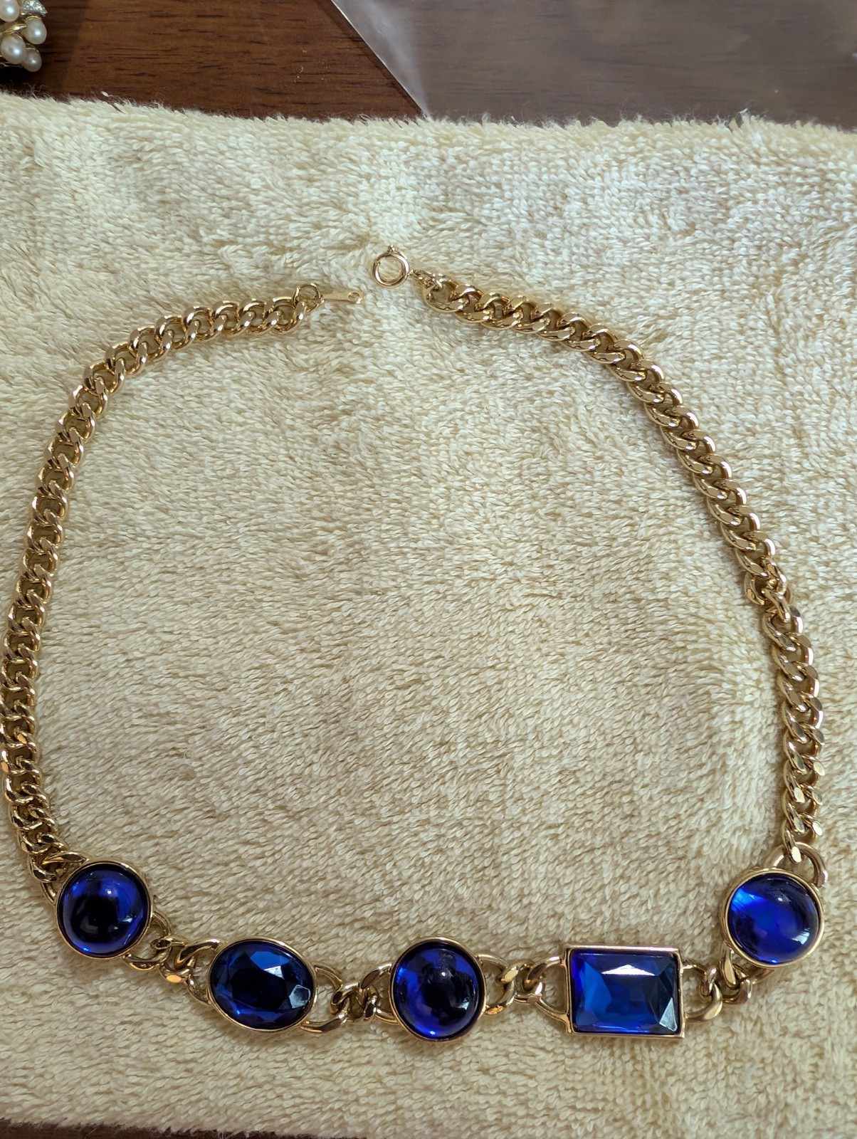 Avon Gold Tone Curb Link Necklace w/ 6 Blue Crystal Stations, Bezel, Signed