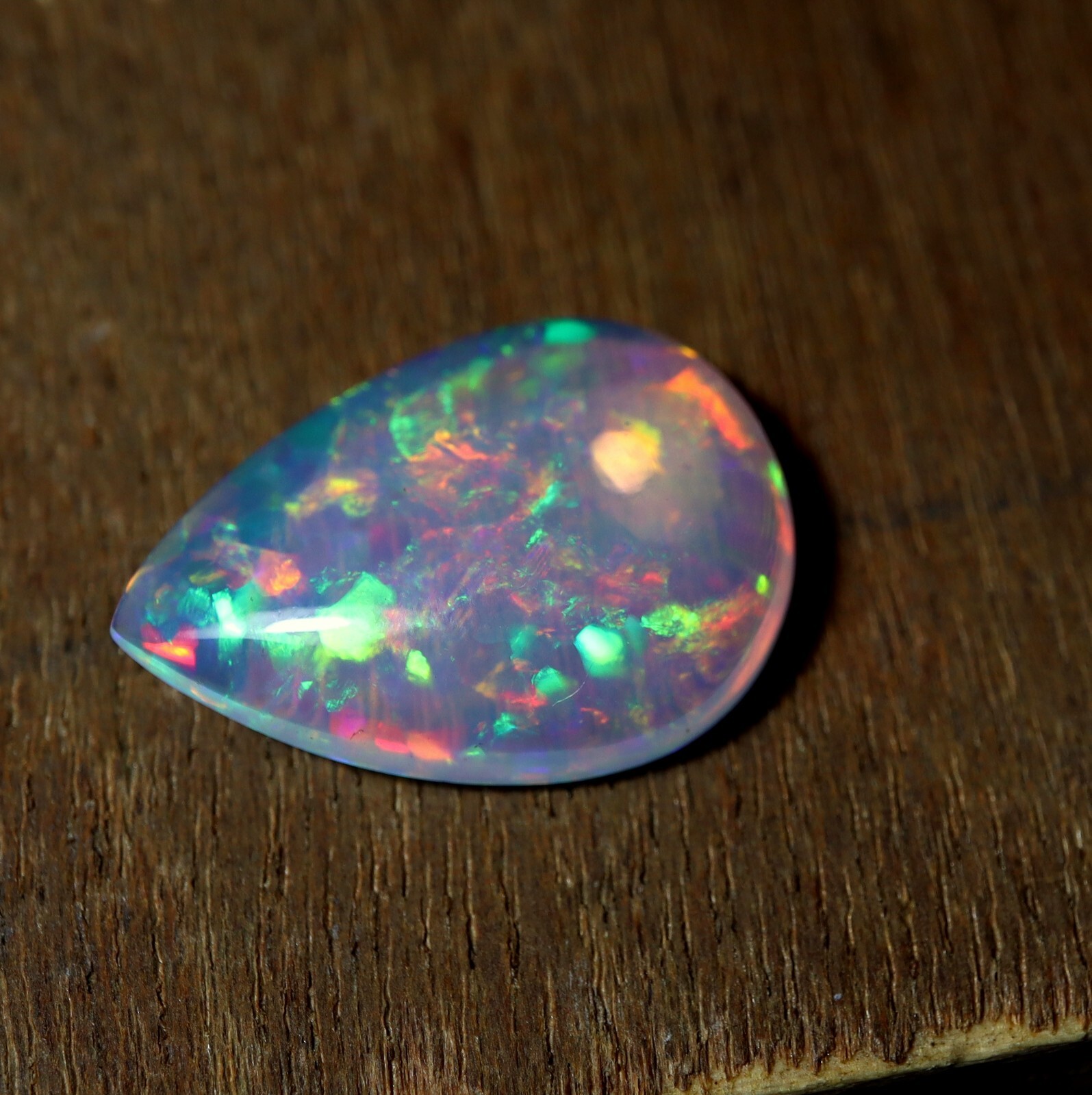 9 Carat 21.9×15.9 MM Natural AAAA Rainbow Fire Ethiopian Welo Opal Pear Shape