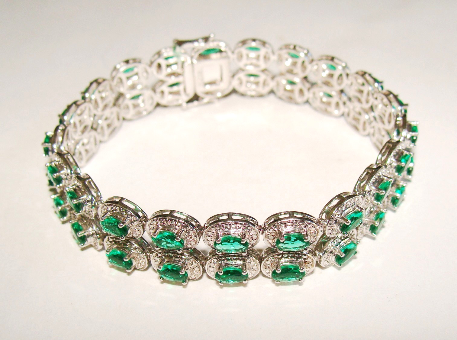 Designer 22.4g Sterling Silver Lab Created Emeralds & 4 Clear Stones Bracelet 7″