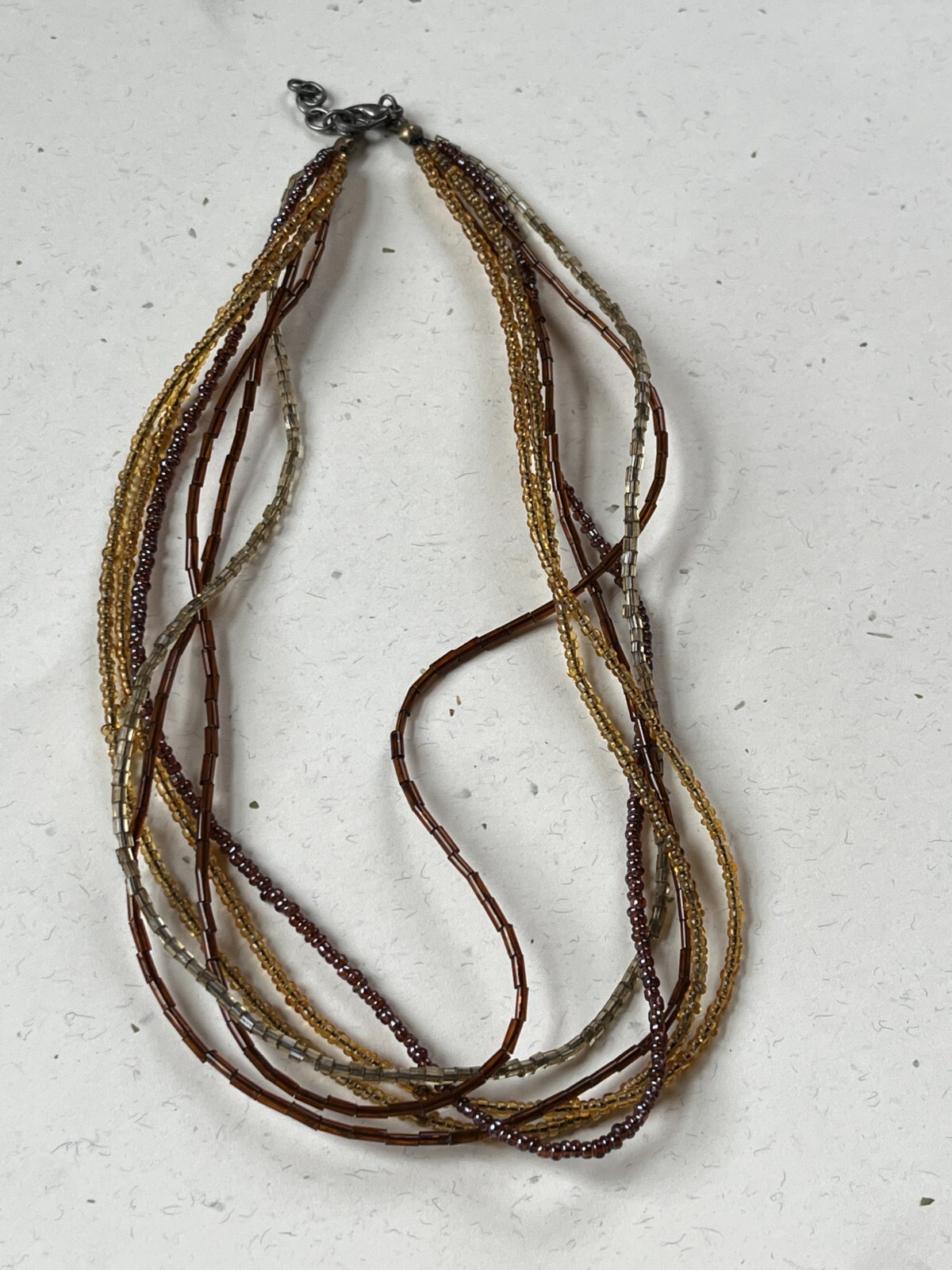 Multistrand Tiny Brown & Yellow Plastic Bead Necklace – 16 inches long + 0.75 in