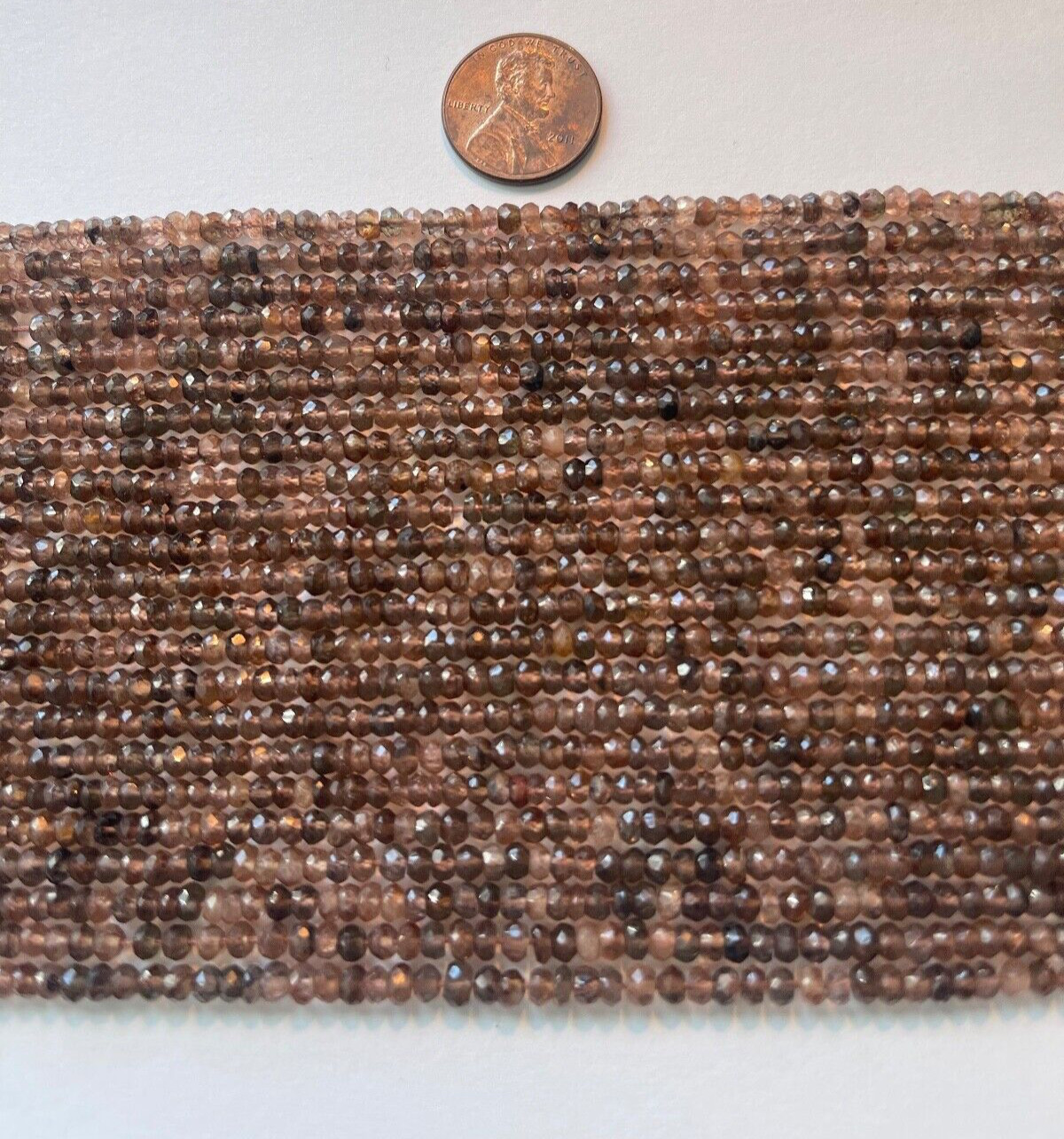 ONE STRAND ANDALUSITE 3.75 MM FACETED RONDELLES STRAND IS 13.75″ BELOW WHOLESALE