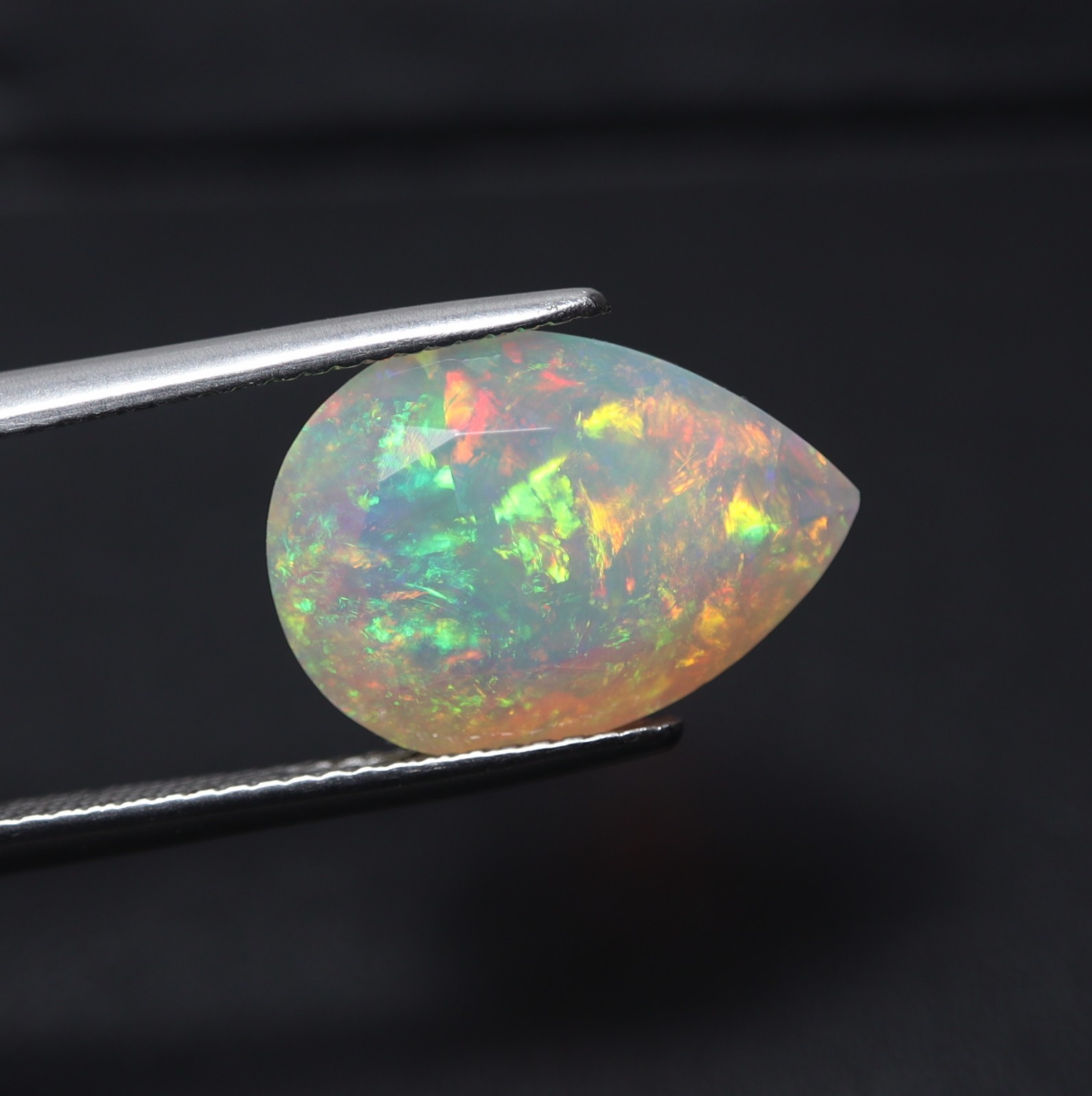 5.3Cts Real AAA Ethiopian Opal Green Red Fire Faceted Pear Gemstone 15.8×11.4MM
