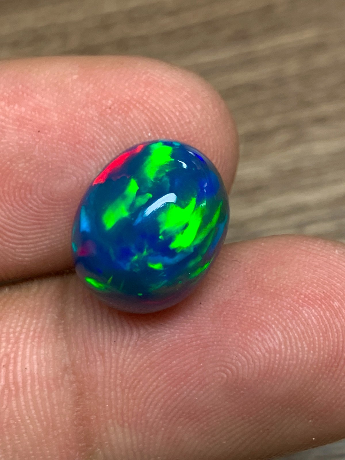 Ethiopian Opal Gemstone 6.35crt Black Oval Cabochon Rainbow Flash Welo Loose Gem