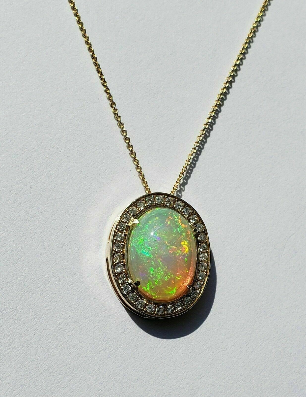 Delicate 3.20Ct Oval Cut Fire Opal Halo Pendant Necklace 14K Yellow Gold Finish.