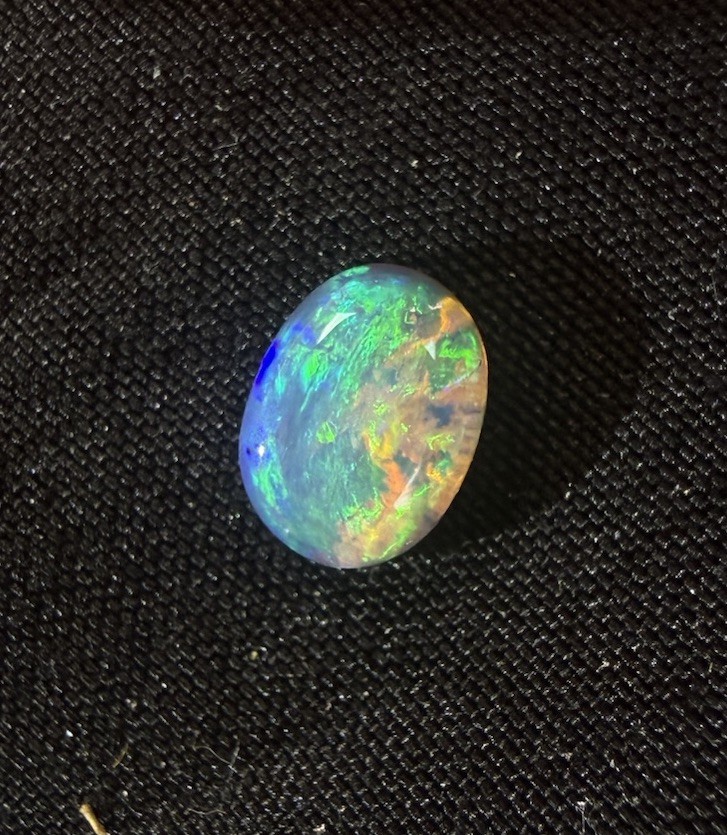Natural Solid Australian Lightning ridge Crystal Opal. .825 Ct. Bright color