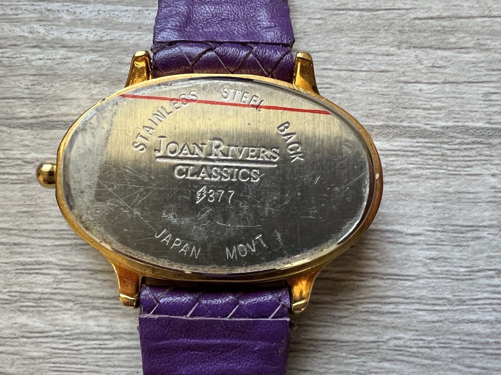 Joan Rivers Classics V377 Women’s Watch – Purple Dial & Woven Leather – New Batt