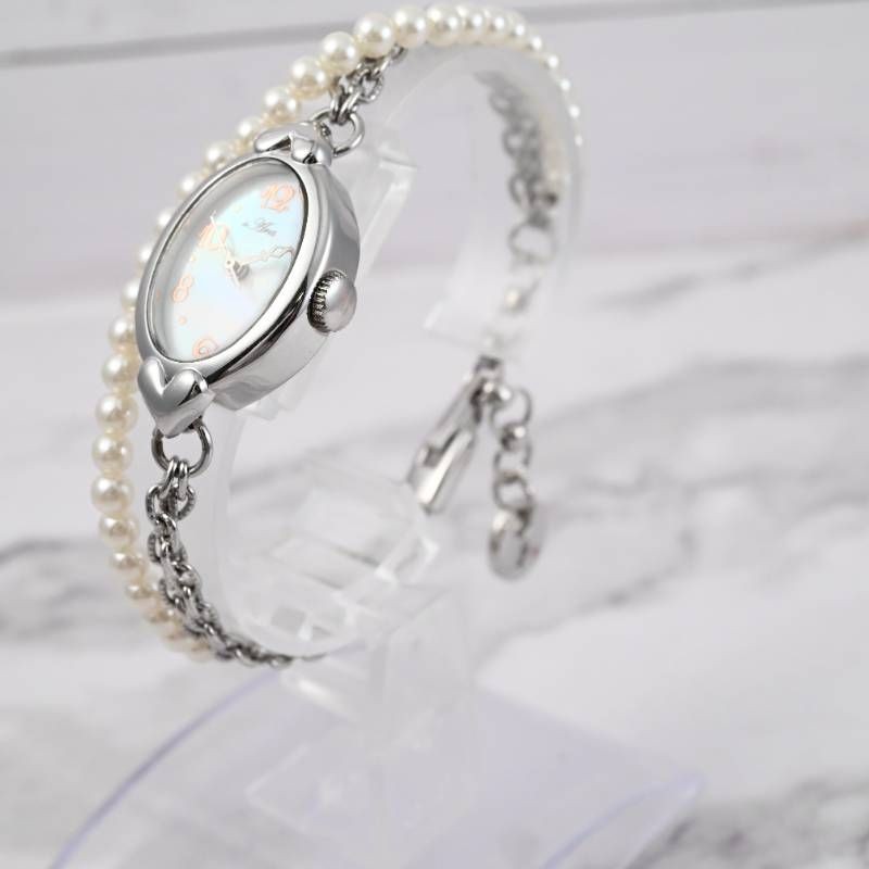 sara ladies’ wristwatch pearl bracelet watch oval shell dial heart motif silver