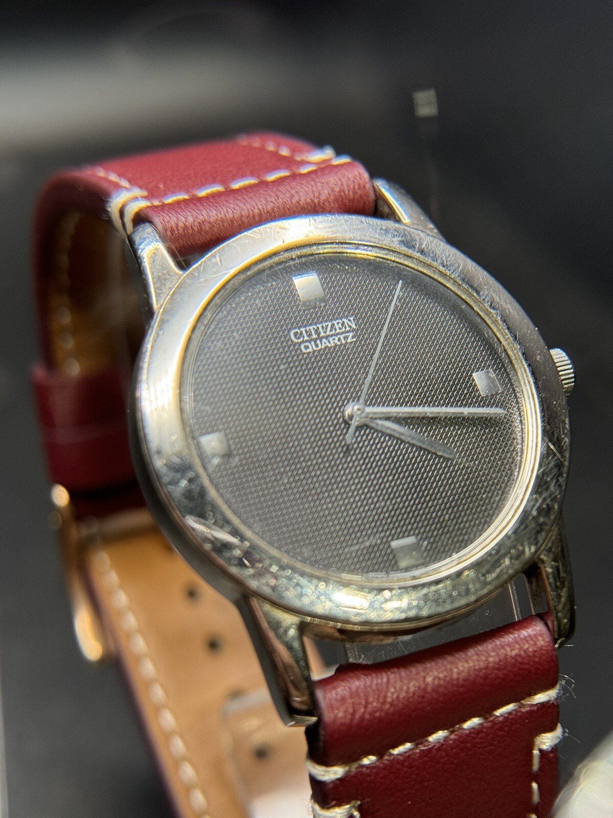 Citizen Quartz Silver Tone Dark Gray Dial Number-Less Watch Burgundy Strap
