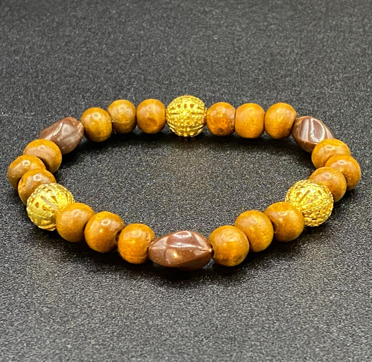 Wood Plastic and Gold Tone Metal Bead Stretch Bracelet