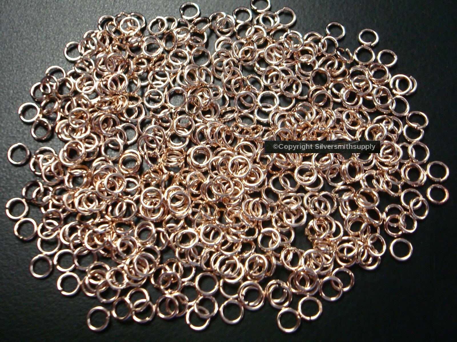 JUMP RINGS Lt Rose gold plated open 4mm dia. round wire 20 ga 500 pcs FPJ093
