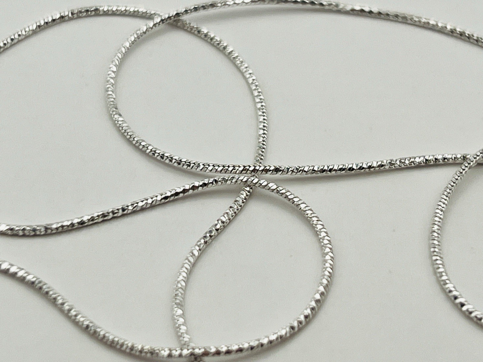 Sterling Silver .9mm Diamond Cut Snake Chain Necklace 18 Inches