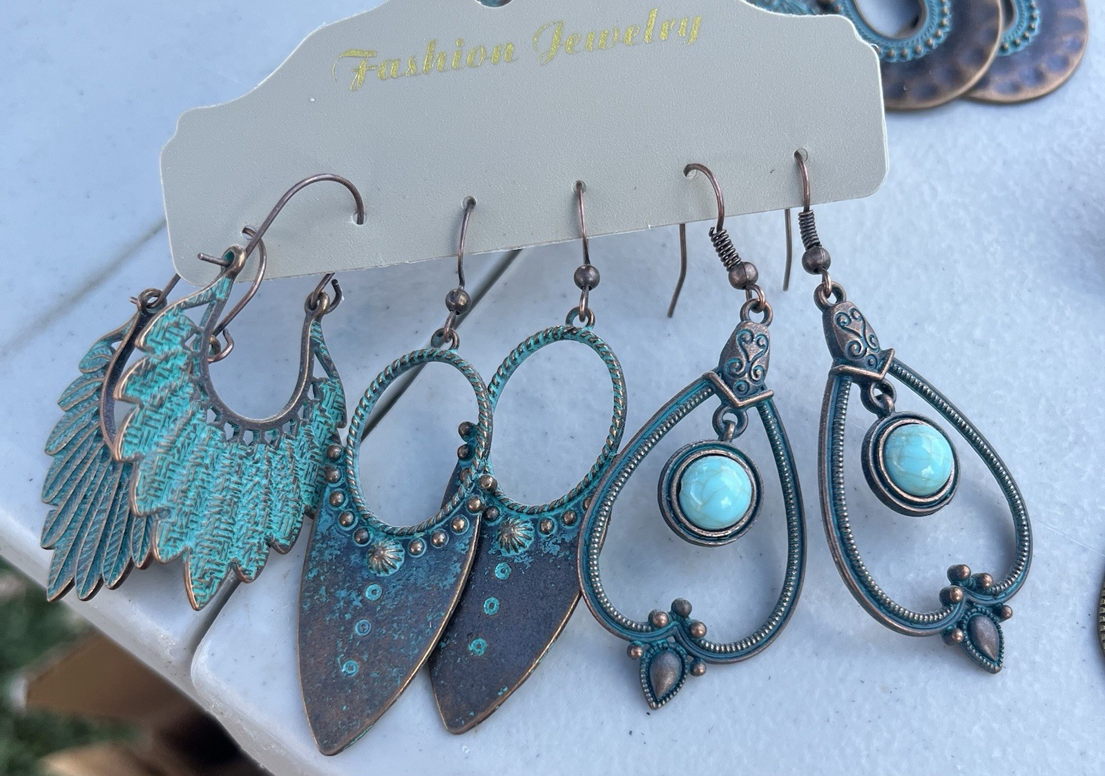 12 pair Bohemian dangle Turquoise/ bronze earrings- brand new