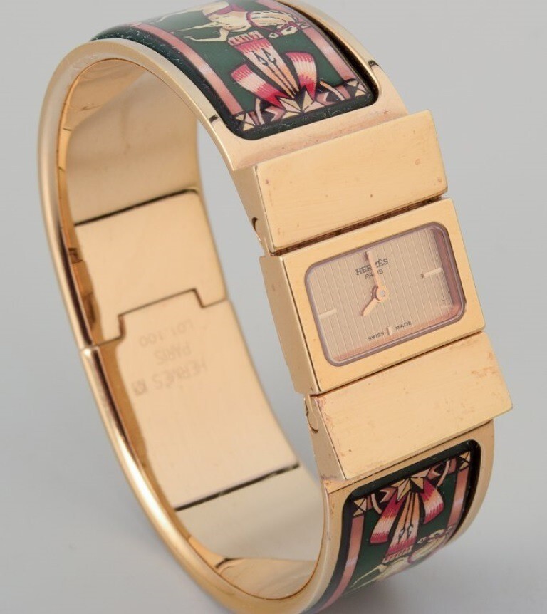 Hermes, ladies’ wristwatch. Made of gilded metal and enamel work.