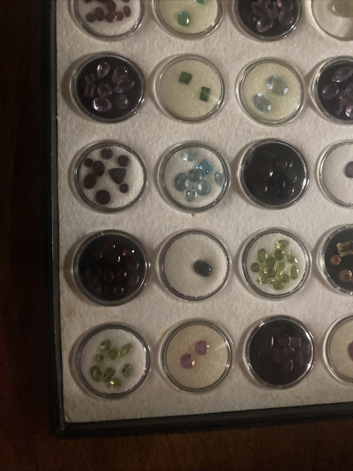 Assorted Multicolor Cut Loose Gemstones in Display Case, Gems In 100 Capsules
