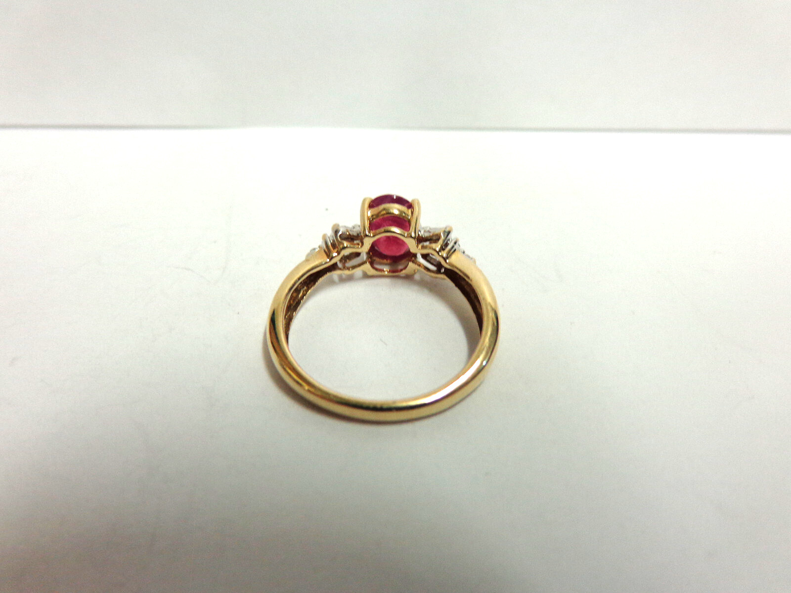 10kt yellow gold ruby/diamond ring sz 7 wgt 2.4 grams tcw 1.12 solitaire/accents